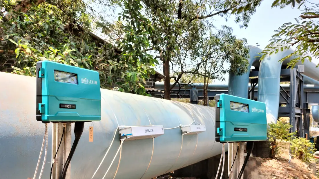 FLEXIM clamp-on ultrasonic flow meters installed on a large pipeline